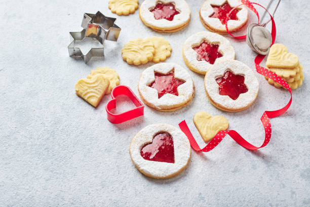 istock Classic Linzer Christmas Cookies with raspberry or strawberry jam on light background. 2178972310