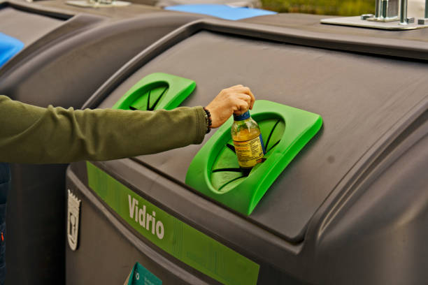 istock Recycling Glass Bottle in Green Bin 2178975576