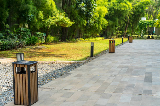 istock Open garden with rubbish bins and cigarette ashtrays for smokers 2178985391