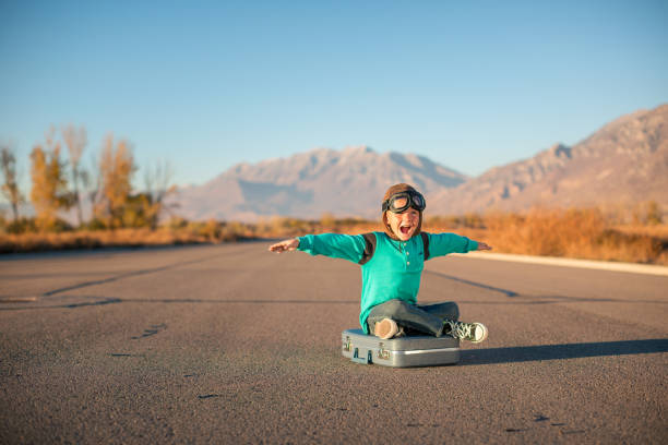 istock Young Boy Imagines Traveling 2178988301