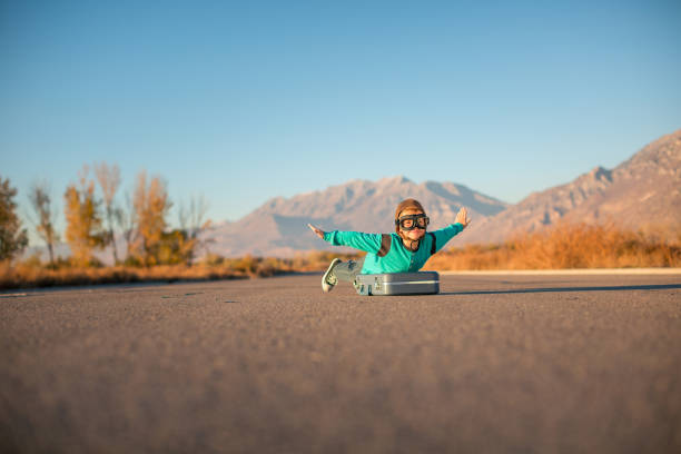 istock Young Boy Imagines Traveling 2178988391