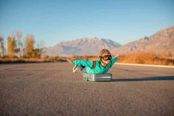 istock Young Boy Imagines Traveling 2178988394
