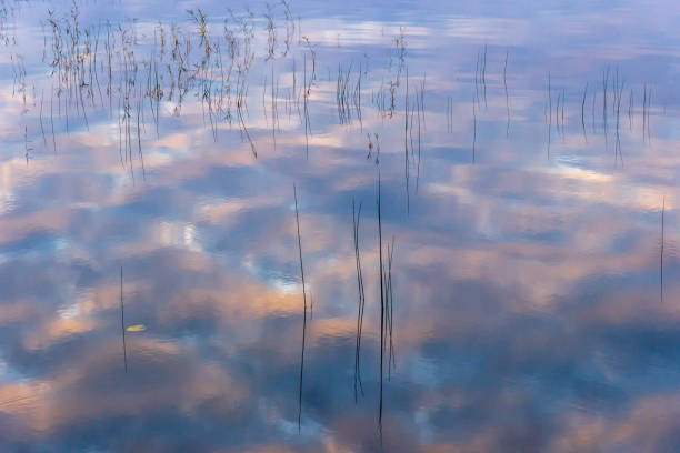 istock Reflection of Clouds in Rippling Water 2178996121