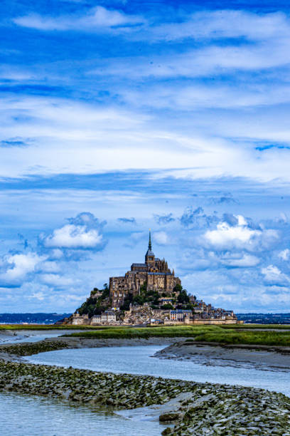 istock Le Mont-Saint-Michel on a cloudy day without the bridge 2178996123