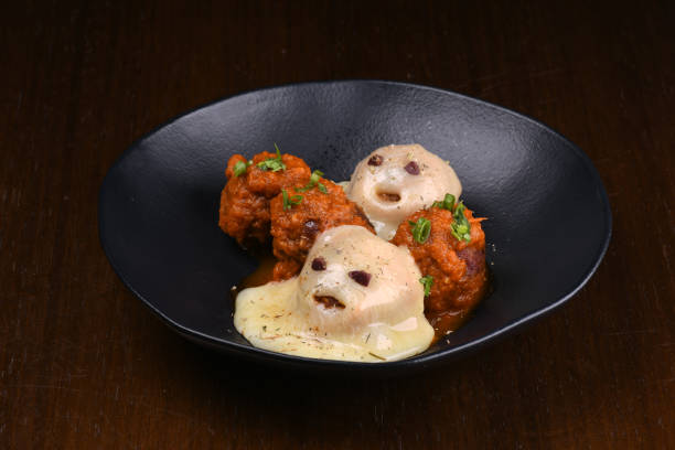 istock funny halloween starter meat dumplings in red sauce with cheese ghost close up fun macro 2179000413