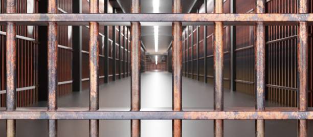 istock Prison interior. Jail cells, corridor and security metal bars. 3d illustration 2179000507