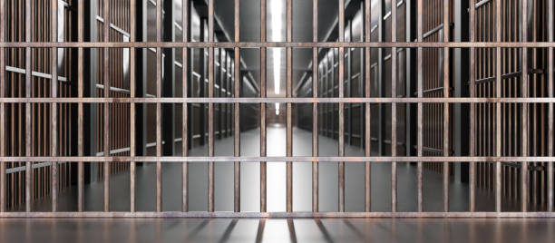 istock Prison interior. Jail cells, corridor and security metal bars. 3d illustration 2179000512