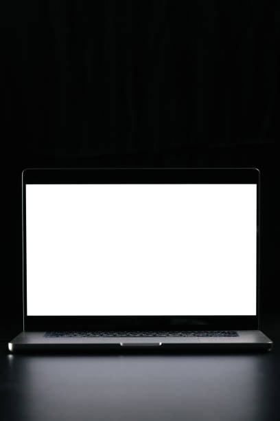 istock Modern laptop with blank white screen isolated on black background. Close up. 2179002223