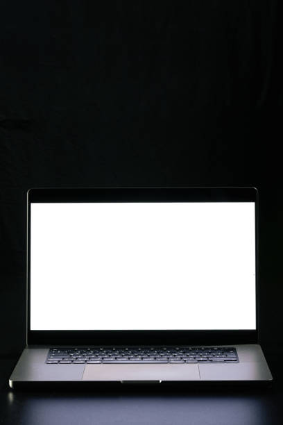 istock Modern laptop with blank white screen isolated on black background. Close up. 2179002240