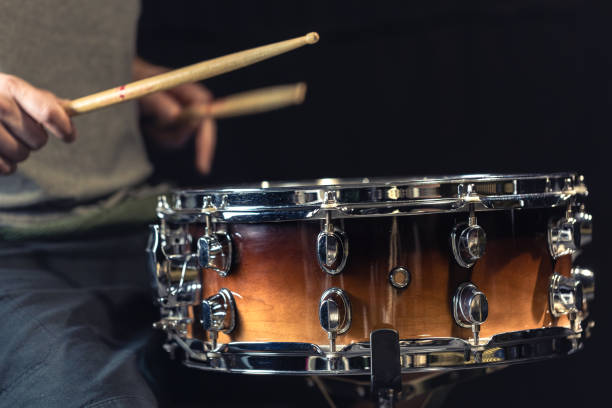 istock A man plays a drum. Drumsticks are hit on the drum. 2179002261