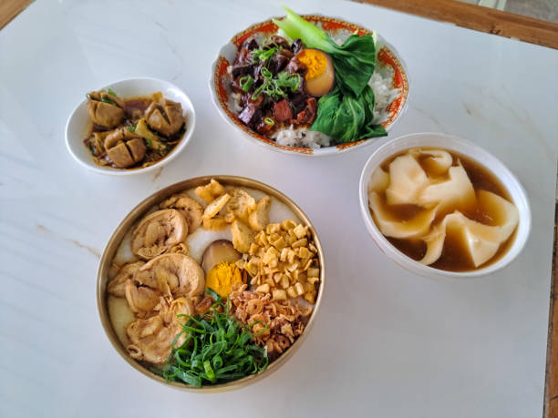 Burpot Chicken Sousvide Is Porridge With Boneless Chicken. Silken Tahoo Or Kembang Tahu Tahoo Tauhue Tauhua Tahwa In Bowl. Lu Rou Fan Rice Bowl Is Soy Sauce Beef Rice. Bakso Daging Sapi Or Steamed Beef Ball Meatball. Food Menu. el pollo burpot sousvide es gachas de avena con pollo deshuesado. tahoo de seda o kembang tahu tahoo tauhue tauhua tahwa en tazón. el tazón de arroz lu rou fan es arroz con carne de res con salsa de soja. bakso daging sapi o albóndiga de bola de terner