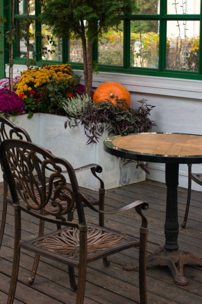 istock tables and chairs, armchairs in the cafe restaurant. A recreation area, a summer veranda and serving tables 2179017708