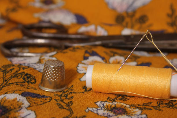 Golden Yellow Thread on Vintage Fabric Close up