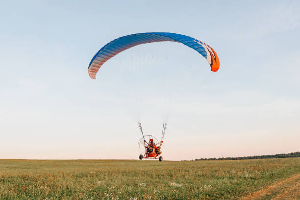 istock Paragliders start to fly in sky 2179027107