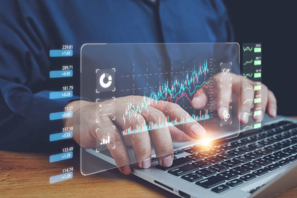 istock Businessman analyzing financial data on laptop screen to analyze Financial Data with KPI and Metrics. Investment, Operations, Sales, Corporate Finance, Strategy. 2179028275