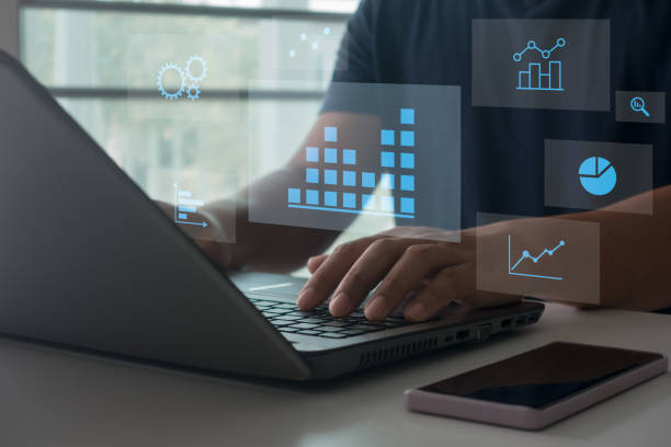 istock Business finance data analytics graph. KPI finance dashboard with charts on virtual screen. Financial management technology. An analyst uses a computer and dashboard for data business analysis. 2179028967