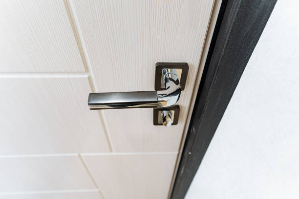 istock The elegant white car door handle seamlessly integrates metal components, showcasing toptier automotive design and craftsmanship. Its a fixture that complements the vehicles exterior 2179056199