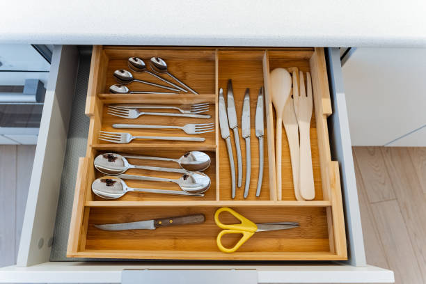 istock A wellorganized modern kitchen drawer filled with cutlery, utensils, and scissors, showcasing functional and neat arrangement of cooking tools and accessories 2179056200