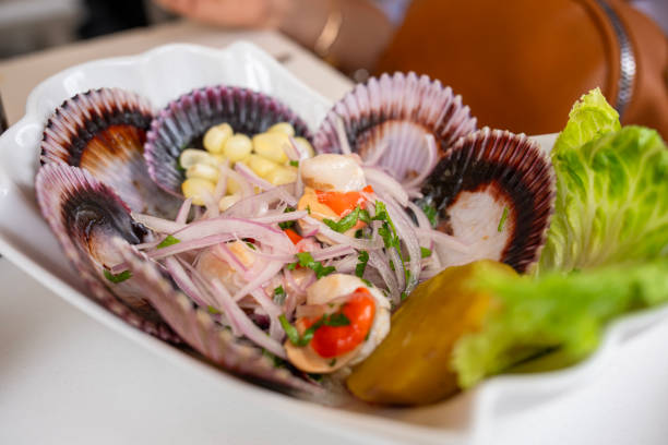 Shell ceviche on a plate in restaurant in Mercado #1 in Surquillo, Lima, Peru