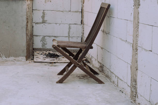 old wooden chair in an empty building