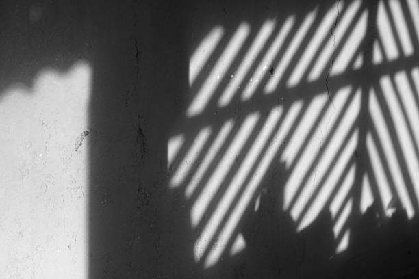 istock Patterned shadows on the walls of the house 2179069226