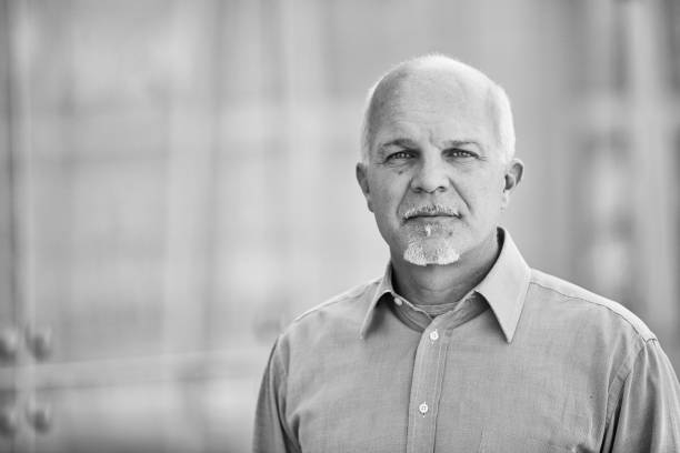 istock Senior businessman looking seriously in black and white 2179071748