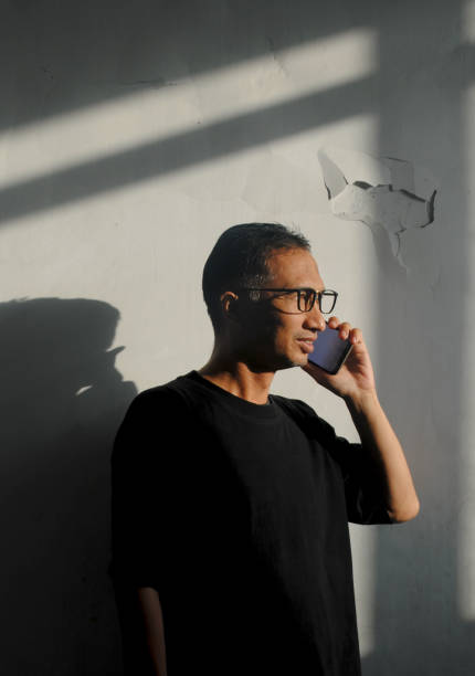 istock Reflection of a man receiving phone call. 2179076528