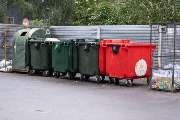 istock Trash cans on street. Garbage collection in urban environment. 2179080535