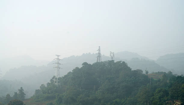 istock Environment pollution in mountain with fog and power tower 2179086510