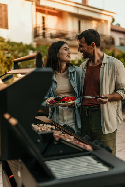 istock Loving couple making a food together 2179099937