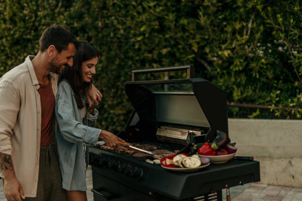 istock Couple grilling together 2179100059