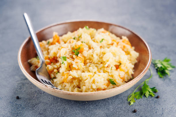 istock risotto with pumpkin, nuts and parmesan 2179103859