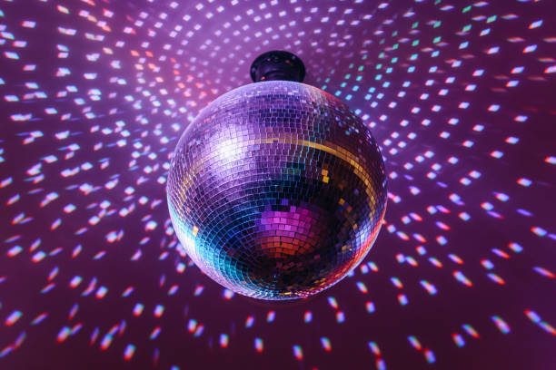 istock disco ball with bright rays, night party background 2179105910