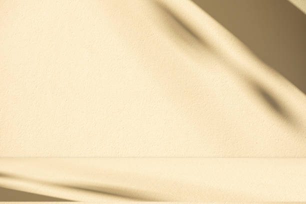 istock Studio style background wall decoration presentation uses white and beige tones. with shadows cast from a nearby window, concept creating a decorative 2179107349