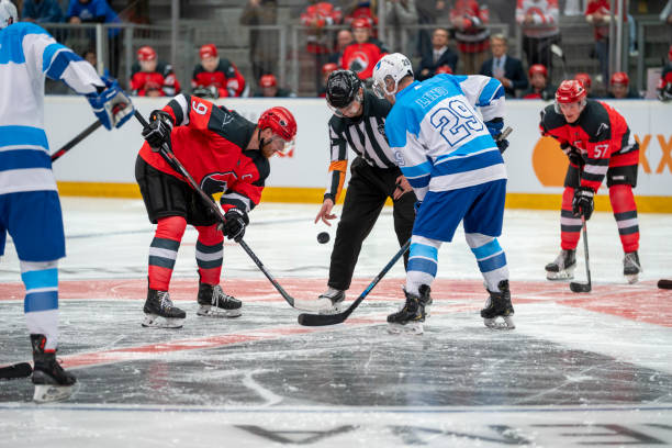 Face-Off Between Rival Teams in Hockey Match