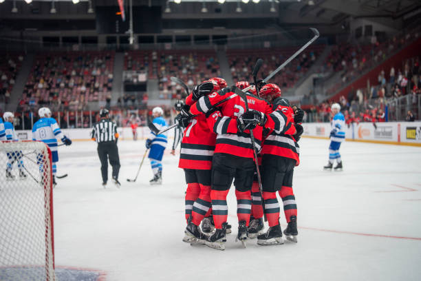 istock Ice Hockey Team Celebrates After Scoring 2179108853
