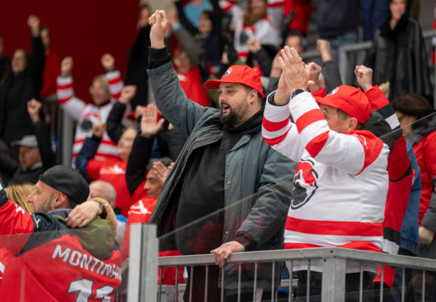 istock Enthusiastic Ice Hockey Fans Cheering 2179108871