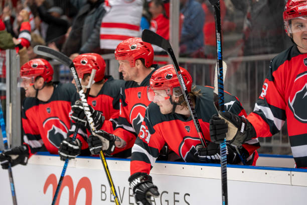 istock Focused Ice Hockey Players on the Bench 2179108933