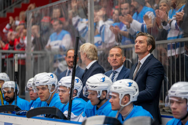 istock Focused Coaches and Players During Intense Ice Hockey Match 2179109061