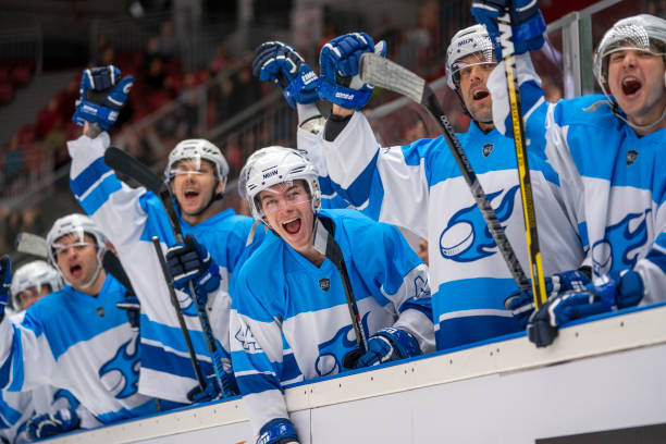 istock Ice Hockey Players Celebrating on the Bench 2179109069