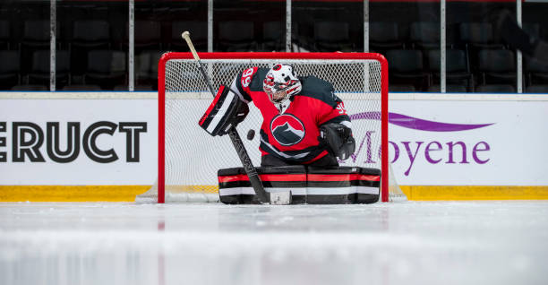 istock Ice Hockey Goalie Blocking a Shot 2179109222
