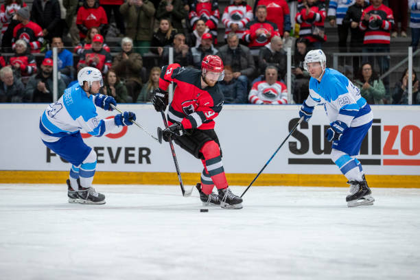 istock Intense Ice Hockey Battle for the Puck 2179109321