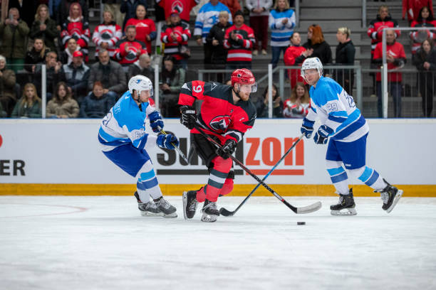istock Fierce Ice Hockey Duel for the Puck 2179109325