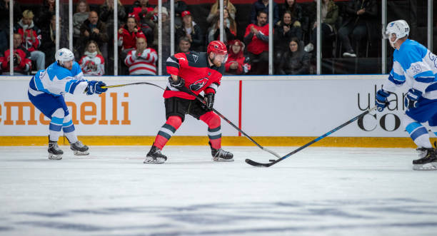 istock Intense Faceoff Between Hockey Players 2179109362