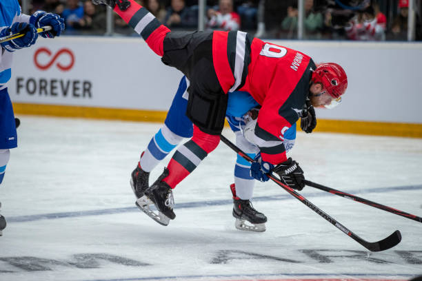 istock Intense Bodycheck During Ice Hockey Match 2179109374