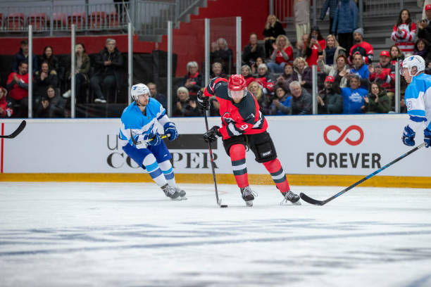 istock Hockey Players in Mid-Action during a Game 2179109405