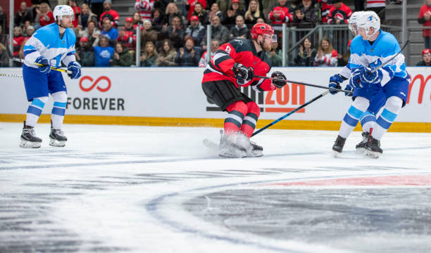 istock Ice Hockey Battle with Skating Precision and Defensive Maneuvers 2179109416