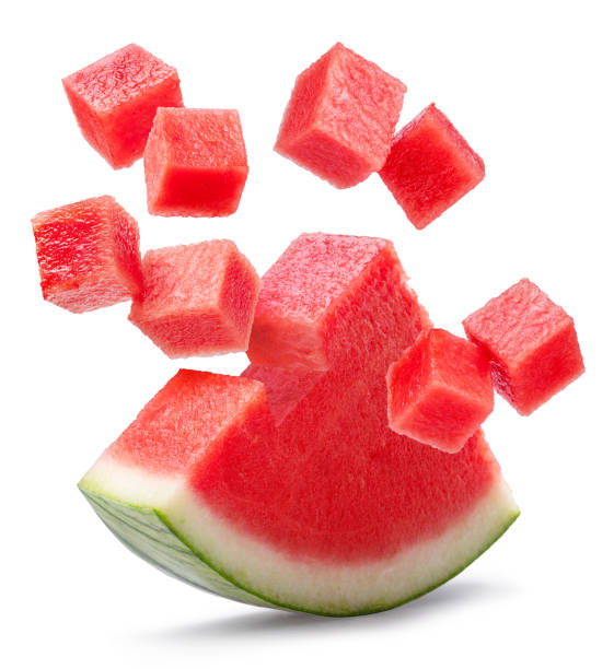 istock Watermelon triangle piece  and watermelon cubes levitating in air on it isolated on white background. File contains clipping paths. 2179110697