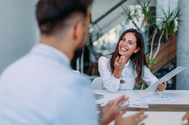 istock Group of business persons talking in the office. 2179110808