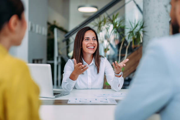 istock Group of business persons talking in the office. 2179110810